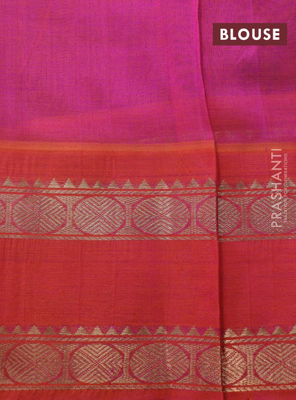 Silk cotton saree blue and dual shade of pinkish orange with allover zari woven checked pattern and rettapet zari woven korvai border