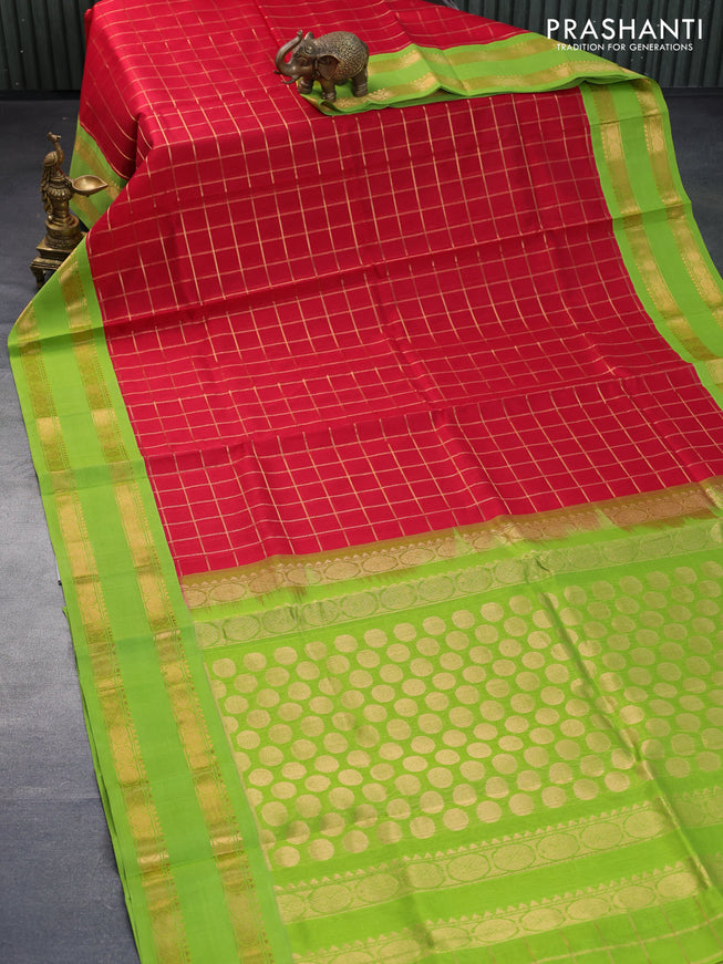 Silk cotton saree red and light green with allover zari woven checked pattern and rettapet zari woven korvai border