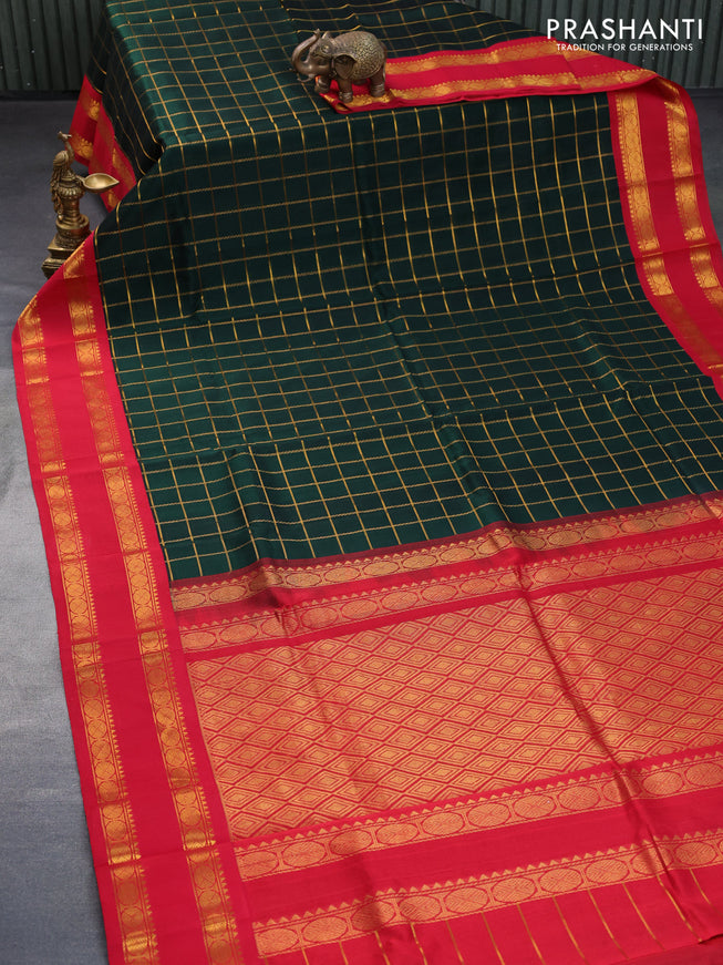 Silk cotton saree bottle green and red with allover zari woven checked pattern and rettapet zari woven korvai border