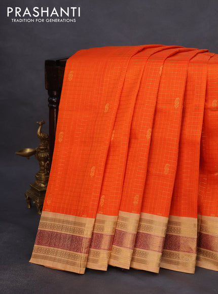 Silk cotton saree orange and sandal with allover zari checks & buttas and zari woven korvai border