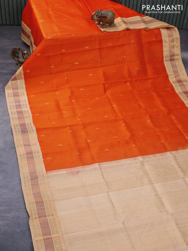 Silk cotton saree orange and sandal with allover zari checks & buttas and zari woven korvai border