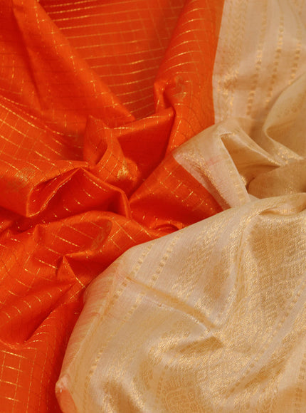 Silk cotton saree orange and sandal with allover zari checks & buttas and zari woven korvai border