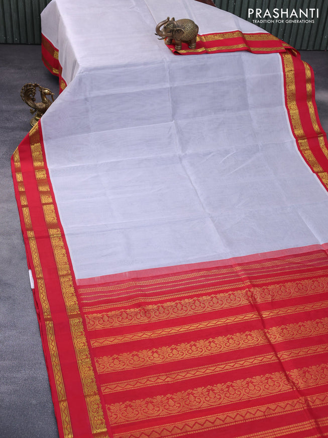 Silk cotton saree pastel grey and red with plain body and rettapet zari woven korvai border