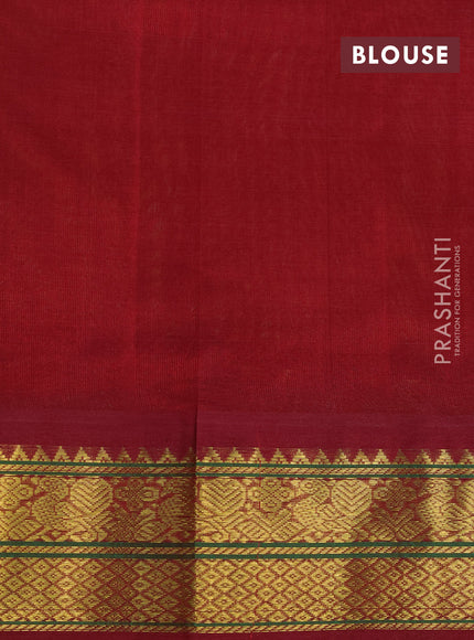 Silk cotton saree pale yellow and maroon with plain body and zari woven korvai border