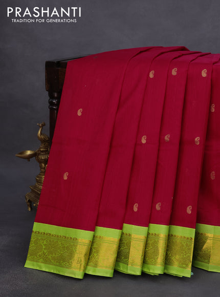 Silk cotton saree red and light green with paisley zari woven buttas and zari woven korvai border