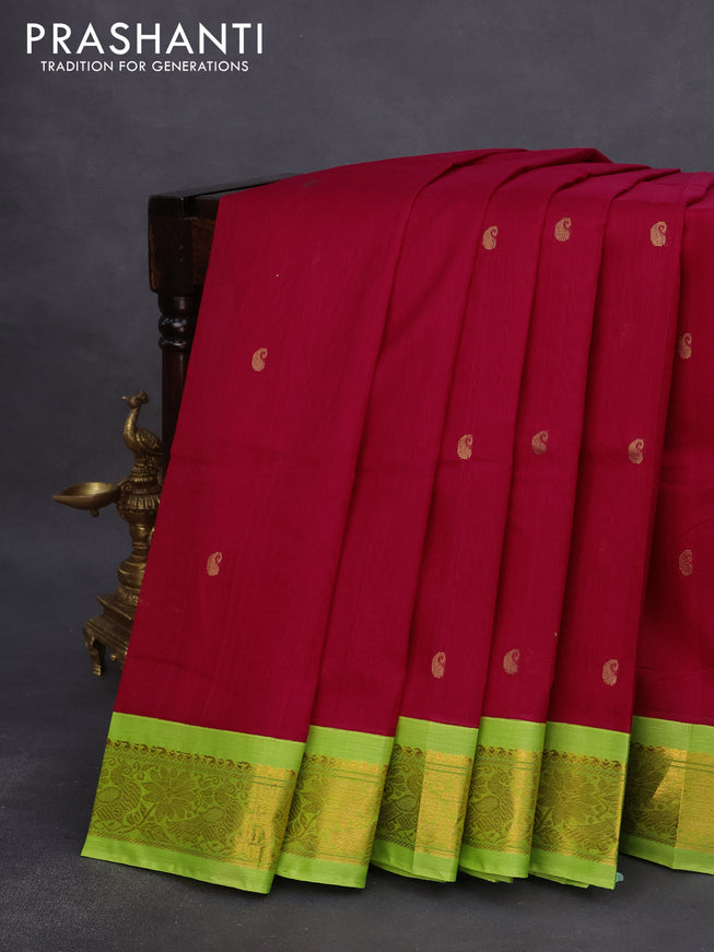 Silk cotton saree red and light green with paisley zari woven buttas and zari woven korvai border