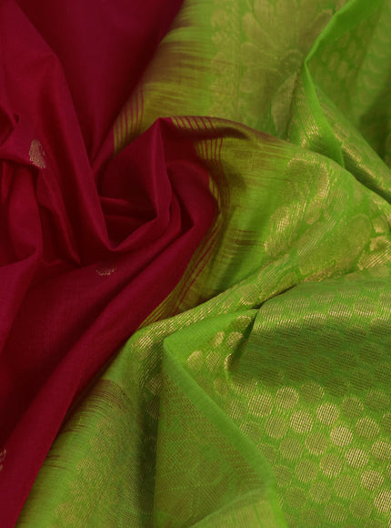 Silk cotton saree red and light green with paisley zari woven buttas and zari woven korvai border