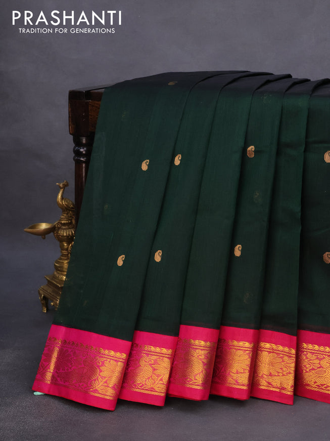 Silk cotton saree bottle green and pink with paisley zari woven buttas and zari woven korvai border