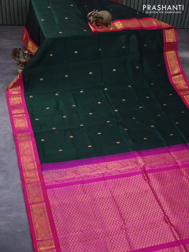 Silk cotton saree bottle green and pink with paisley zari woven buttas and zari woven korvai border