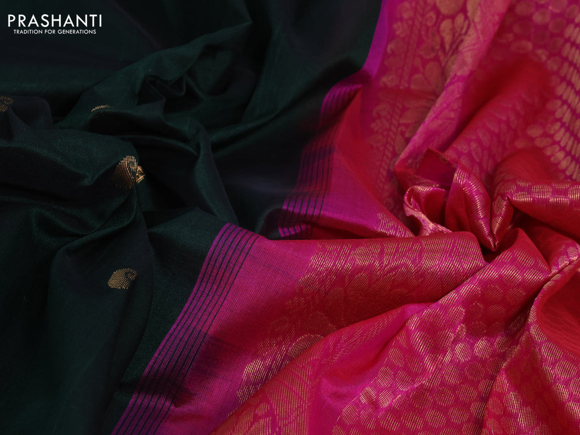 Silk cotton saree bottle green and pink with paisley zari woven buttas and zari woven korvai border