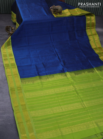 Silk cotton saree peacock blue and light green with plain body and rettapet zari woven korvai border