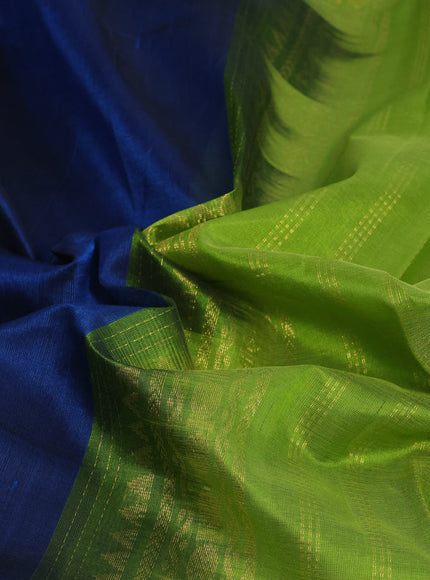 Silk cotton saree peacock blue and light green with plain body and rettapet zari woven korvai border