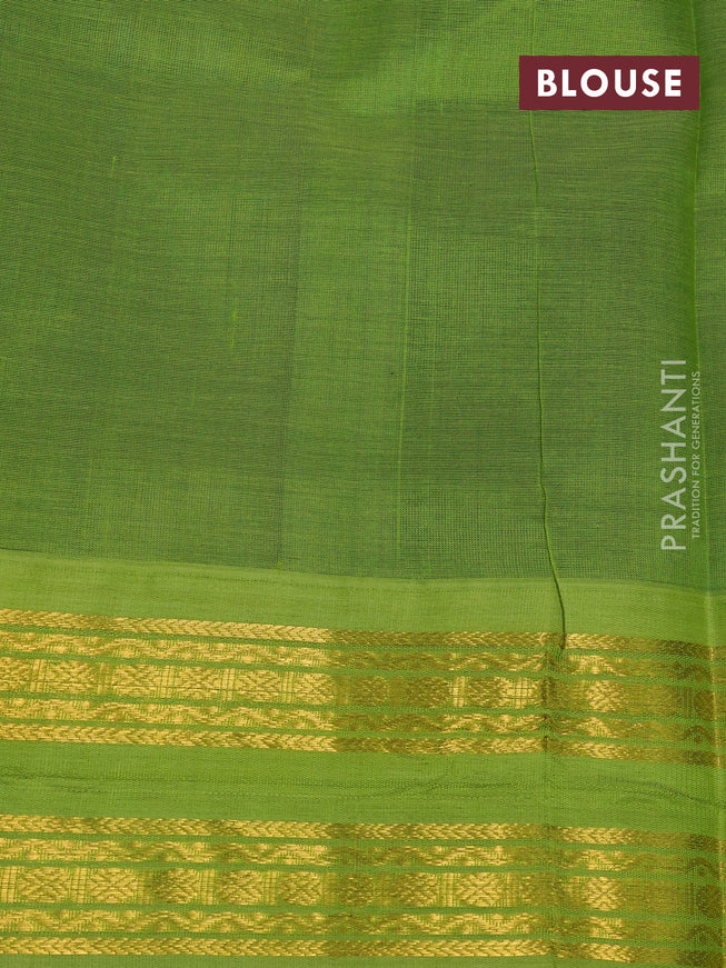 Silk cotton saree peacock blue and light green with plain body and rettapet zari woven korvai border