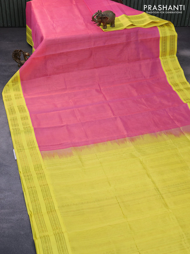 Silk cotton saree peach pink and yellow with plain body and rettapet zari woven korvai border