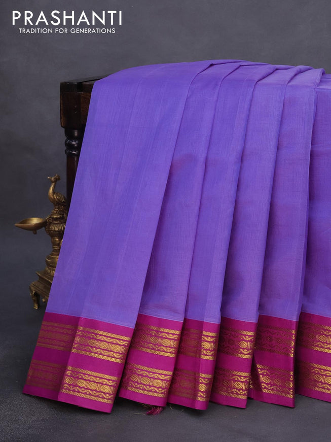 Silk cotton saree lavender shade and purple with plain body and rettapet zari woven korvai border