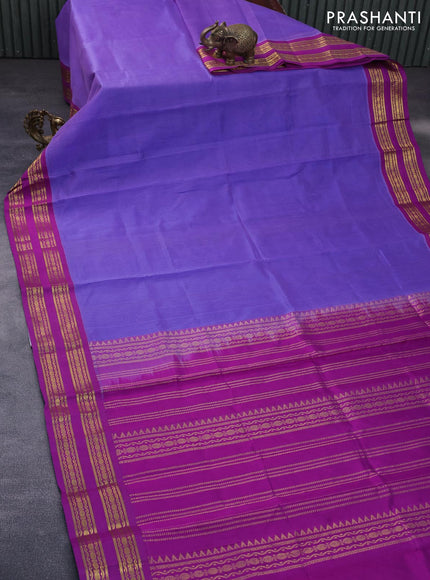 Silk cotton saree lavender shade and purple with plain body and rettapet zari woven korvai border