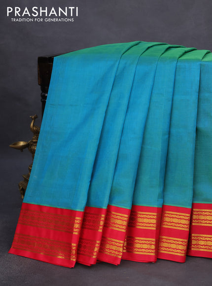 Silk cotton saree dual shade of greenish blue and red with plain body and rettapet zari woven korvai border