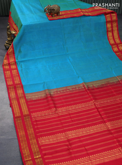 Silk cotton saree dual shade of greenish blue and red with plain body and rettapet zari woven korvai border