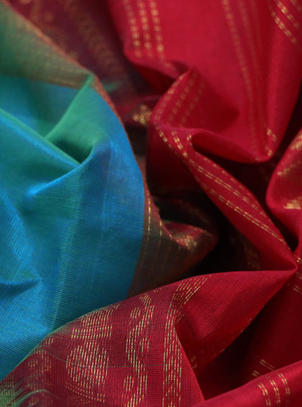 Silk cotton saree dual shade of greenish blue and red with plain body and rettapet zari woven korvai border