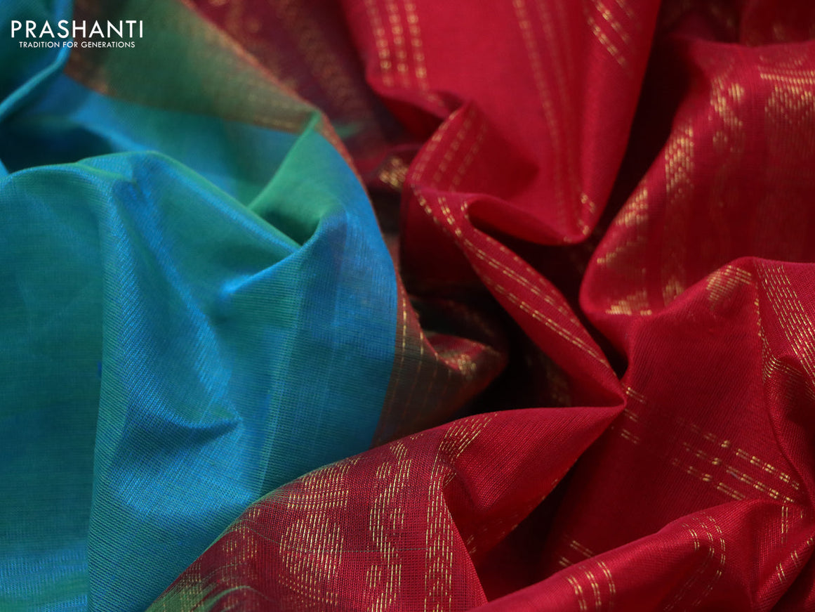 Silk cotton saree dual shade of greenish blue and red with plain body and rettapet zari woven korvai border