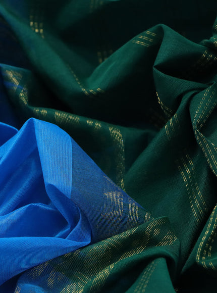 Silk cotton saree blue and green with plain body and rettapet zari woven korvai border