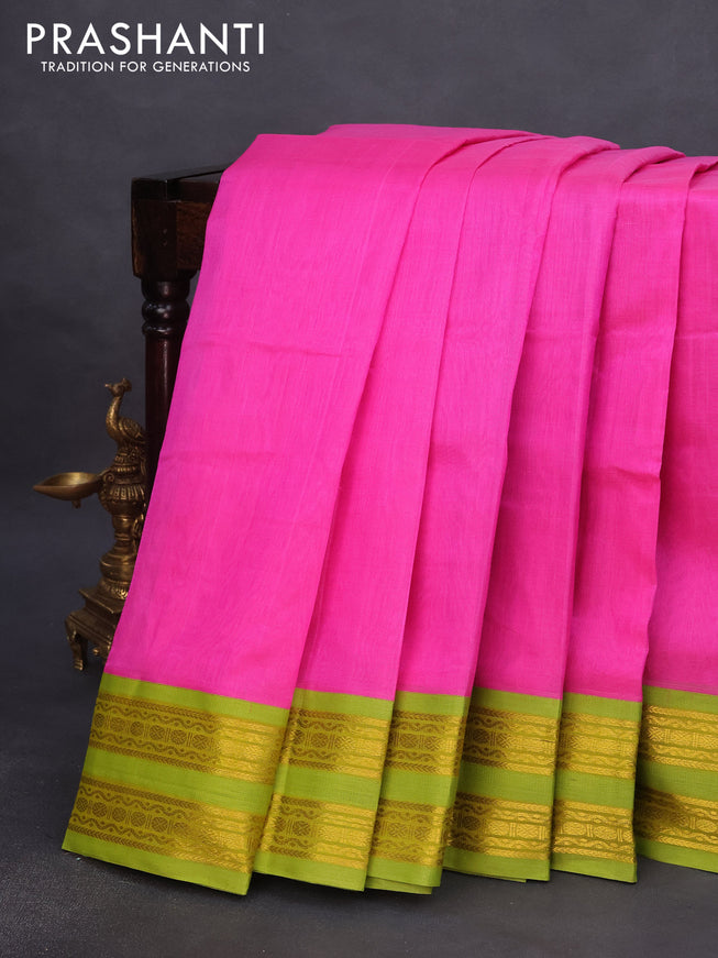 Silk cotton saree candy pink and light green with plain body and rettapet zari woven korvai border