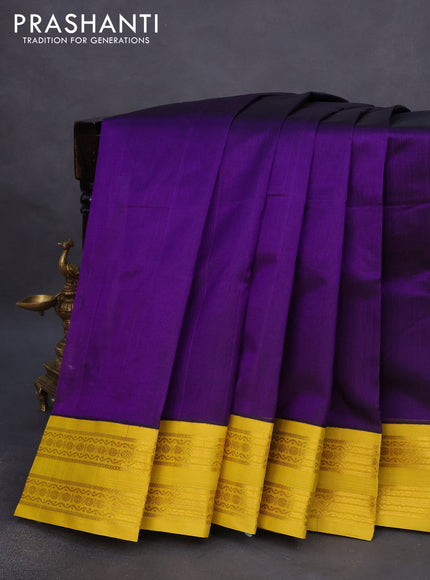 Silk cotton saree deep violet and yellow with plain body and rettapet zari woven korvai border