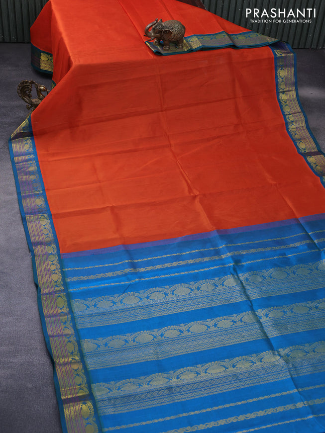 Silk cotton saree orange and dual shade of cs blue with plain body and zari woven korvai border