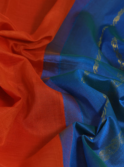 Silk cotton saree orange and dual shade of cs blue with plain body and zari woven korvai border