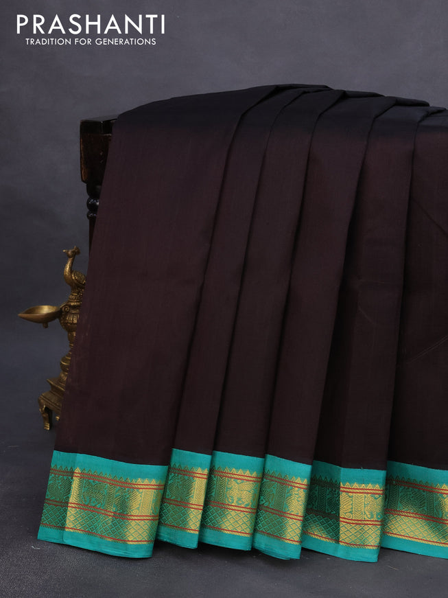 Silk cotton saree dark coffee brown and teal green with plain body and zari woven korvai border