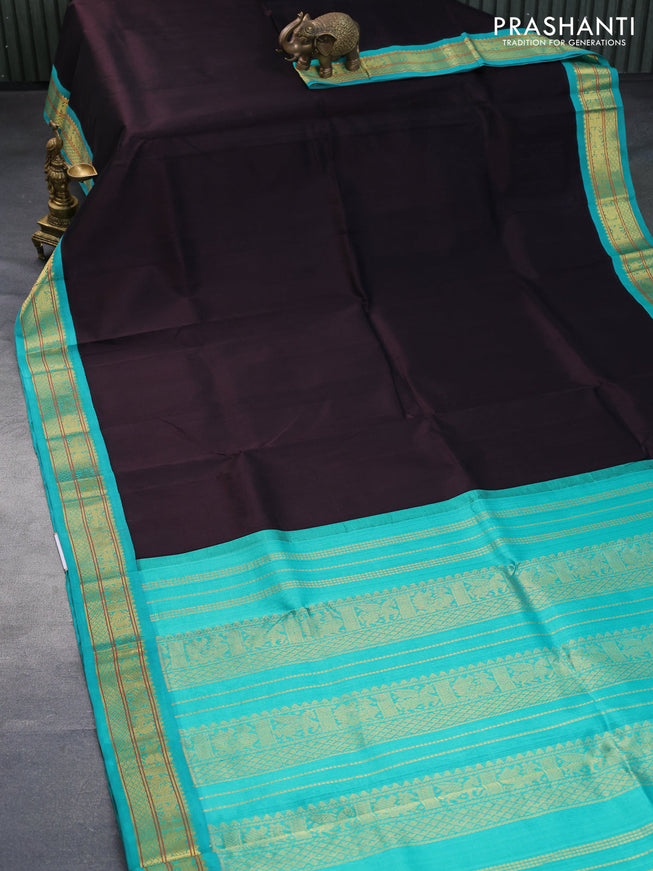 Silk cotton saree dark coffee brown and teal green with plain body and zari woven korvai border