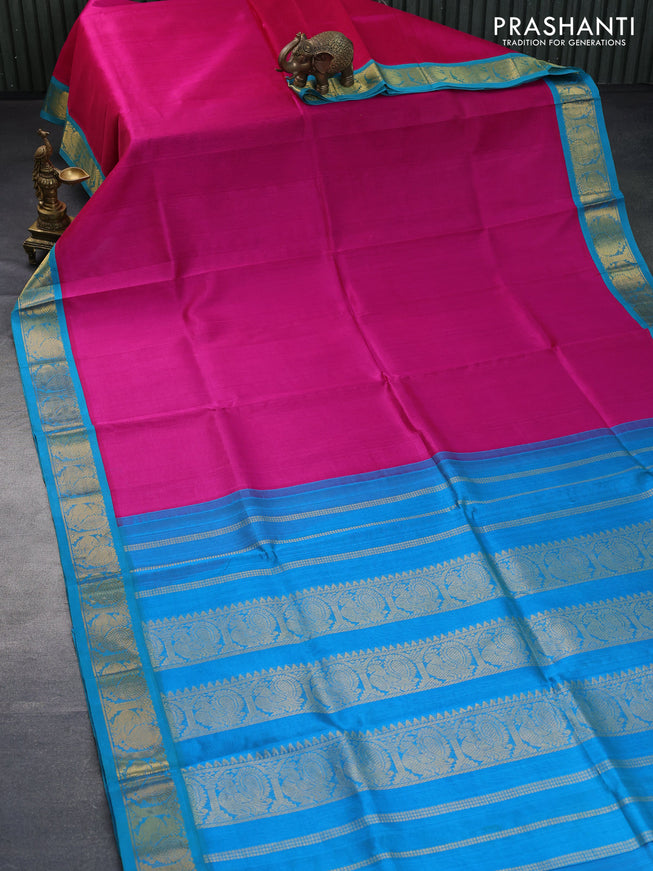 Silk cotton saree dark pink and dual shade of teal blue with plain body and annam zari woven korvai border