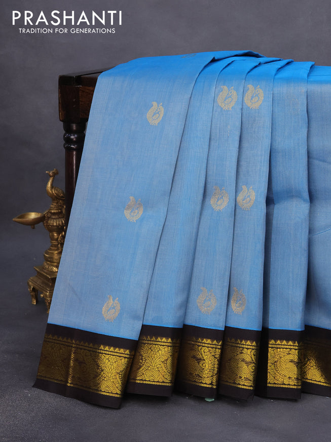 Silk cotton saree blue and dark coffee brown with annam zari woven buttas and zari woven korvai border