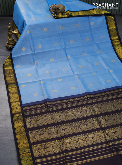 Silk cotton saree blue and dark coffee brown with annam zari woven buttas and zari woven korvai border