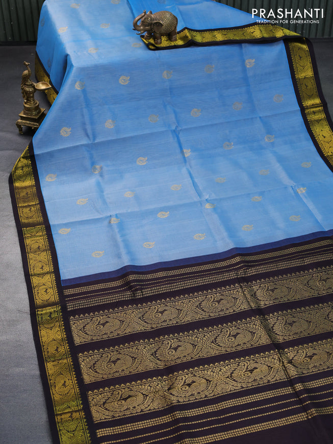 Silk cotton saree blue and dark coffee brown with annam zari woven buttas and zari woven korvai border