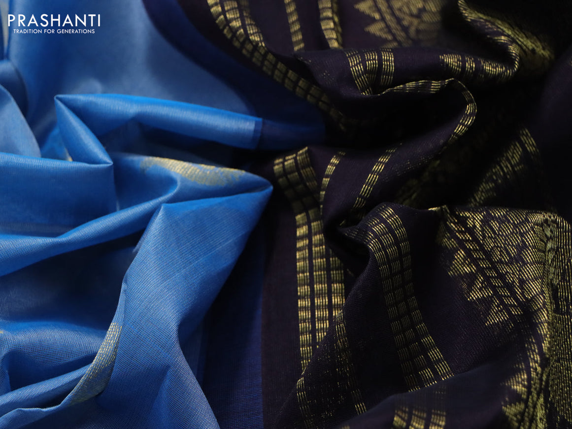 Silk cotton saree blue and dark coffee brown with annam zari woven buttas and zari woven korvai border