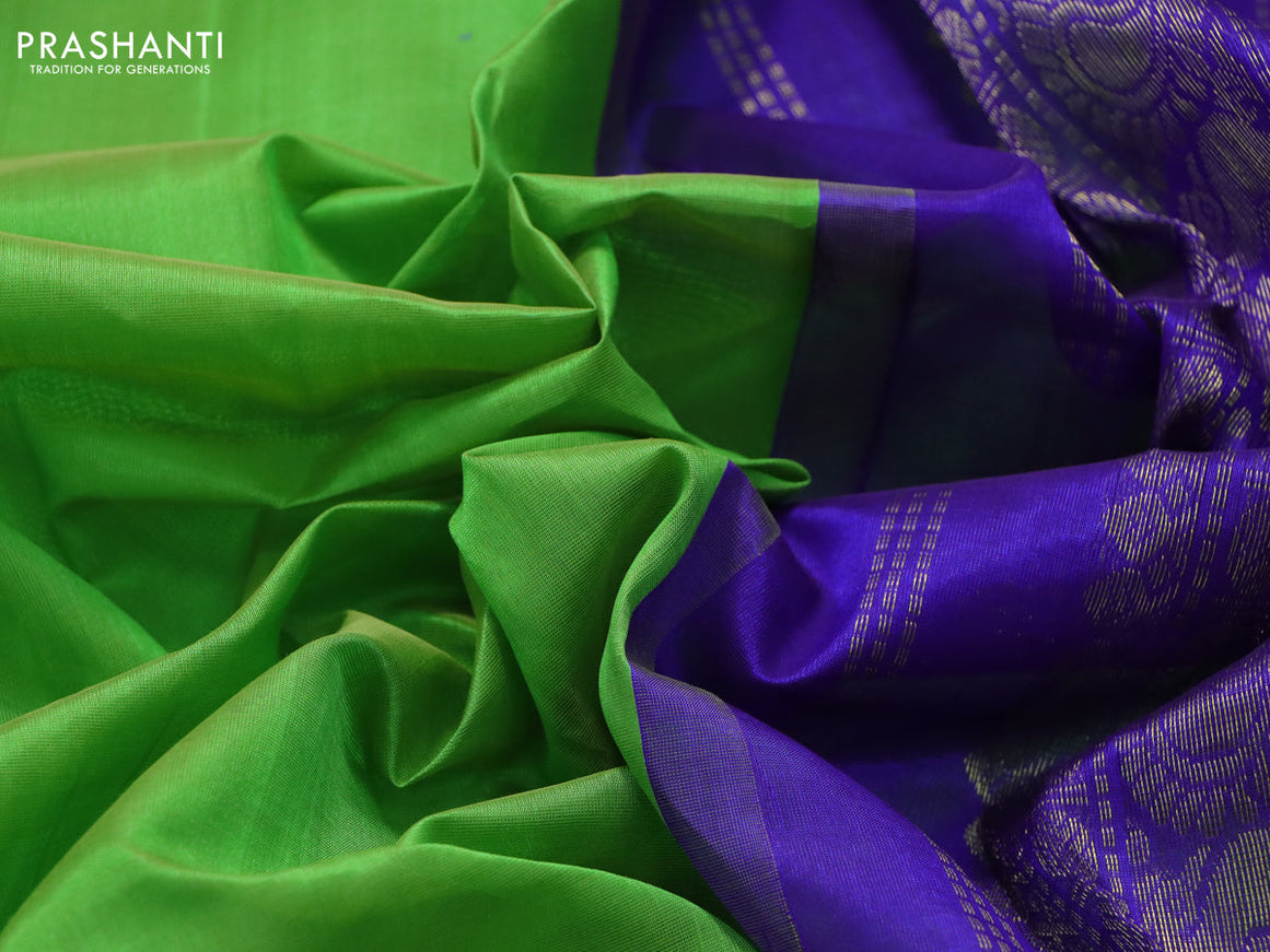 Silk cotton saree light green and violet with plain body and annam zari woven korvai border