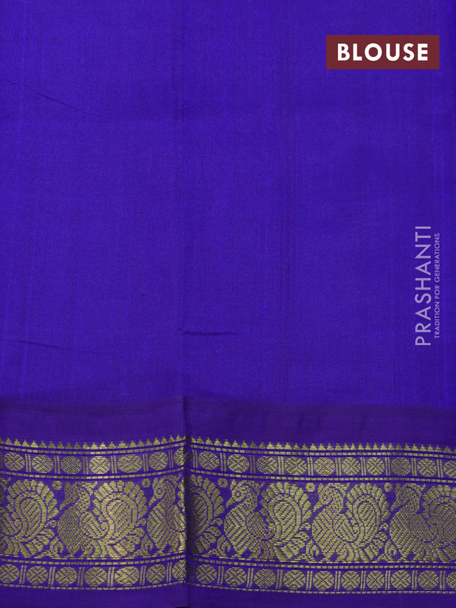 Silk cotton saree light green and violet with plain body and annam zari woven korvai border