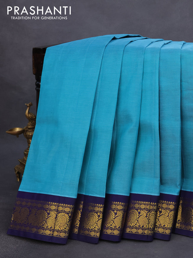 Silk cotton saree blue and navy blue with plain body and annam zari woven korvai border