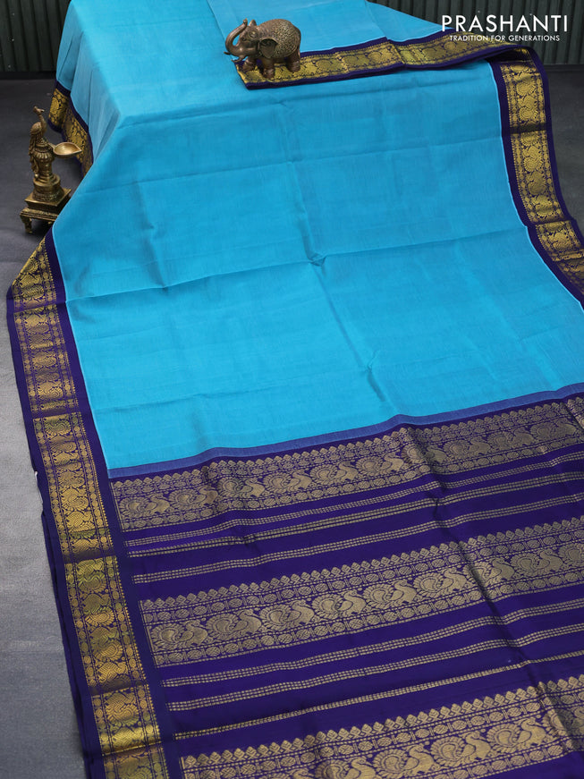 Silk cotton saree blue and navy blue with plain body and annam zari woven korvai border