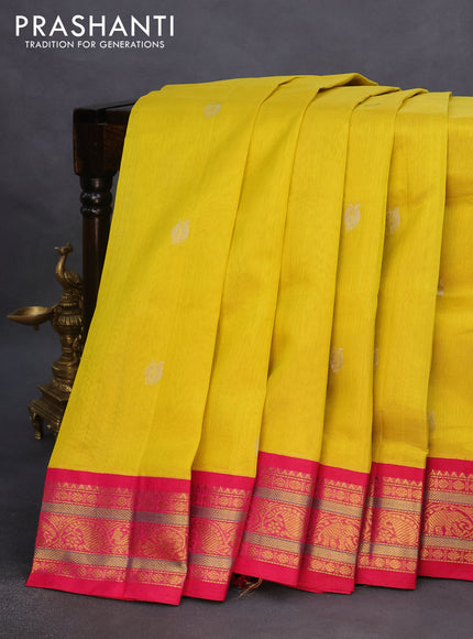 Silk cotton saree yellow and pink with zari woven annam buttas and zari woven korvai border