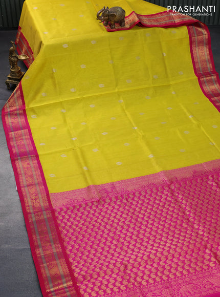 Silk cotton saree yellow and pink with zari woven annam buttas and zari woven korvai border