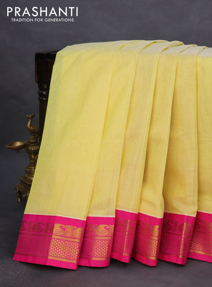 Silk cotton saree pale yellow and pink with plain body and zari woven korvai border