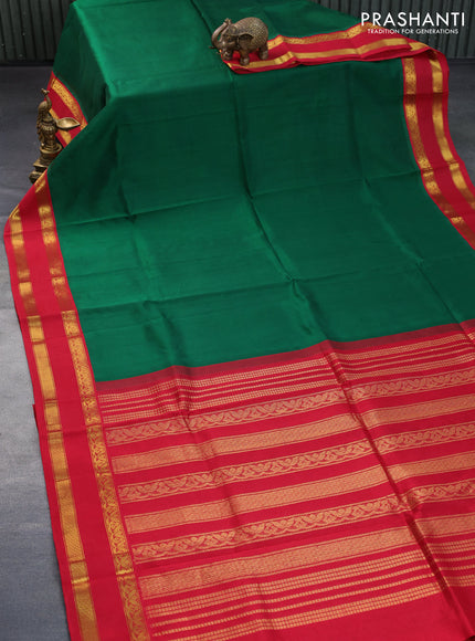 Silk cotton saree dark green and red with plain body and rettapet zari woven korvai border