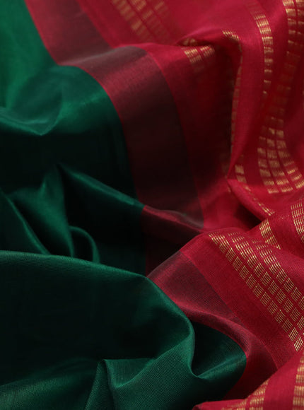 Silk cotton saree dark green and red with plain body and rettapet zari woven korvai border