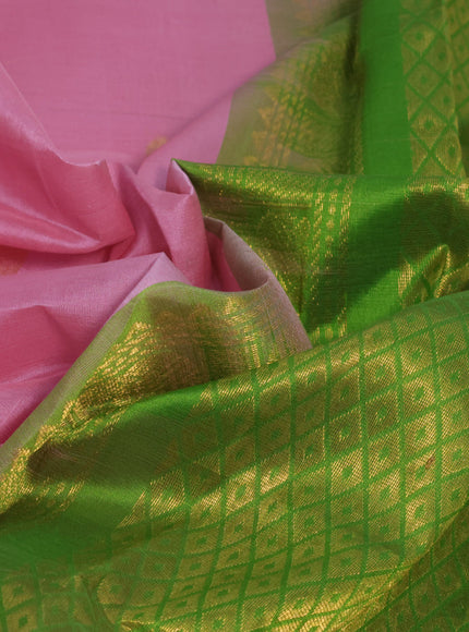 Silk cotton saree light pink and light green with elephant zari woven buttas and rich long zari woven korvai border