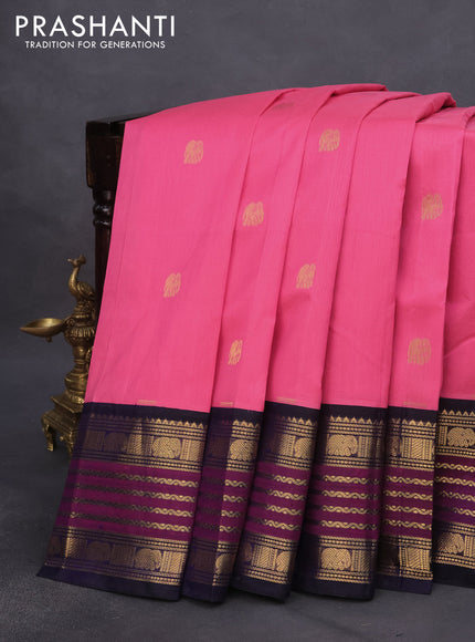 Silk cotton saree peach pink and navy blue with elephant zari woven buttas and rich long zari woven korvai border