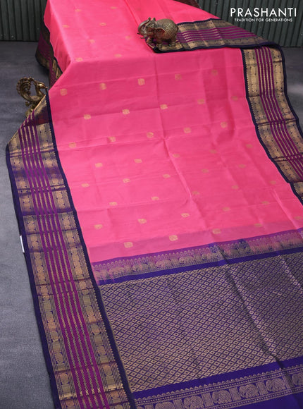 Silk cotton saree peach pink and navy blue with elephant zari woven buttas and rich long zari woven korvai border