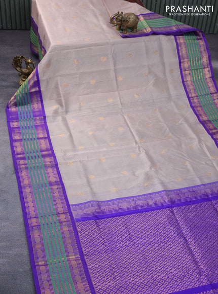 Silk cotton saree grey shade and violet with elephant zari woven buttas and rich long zari woven korvai border