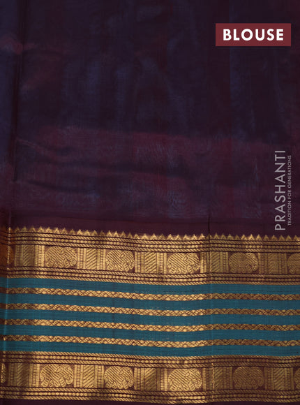 Silk cotton saree light blue and wine shade with elephant zari woven buttas and rich long zari woven korvai border